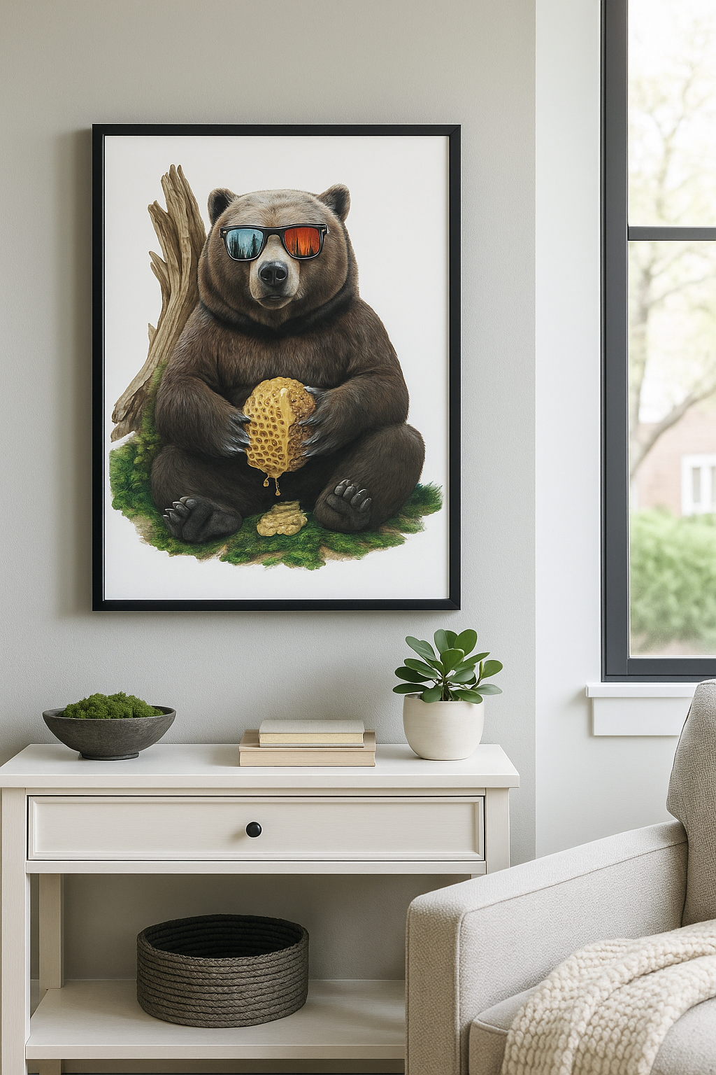 Framed artwork of a bear holding honeycomb and sunglasses in a living room setting.