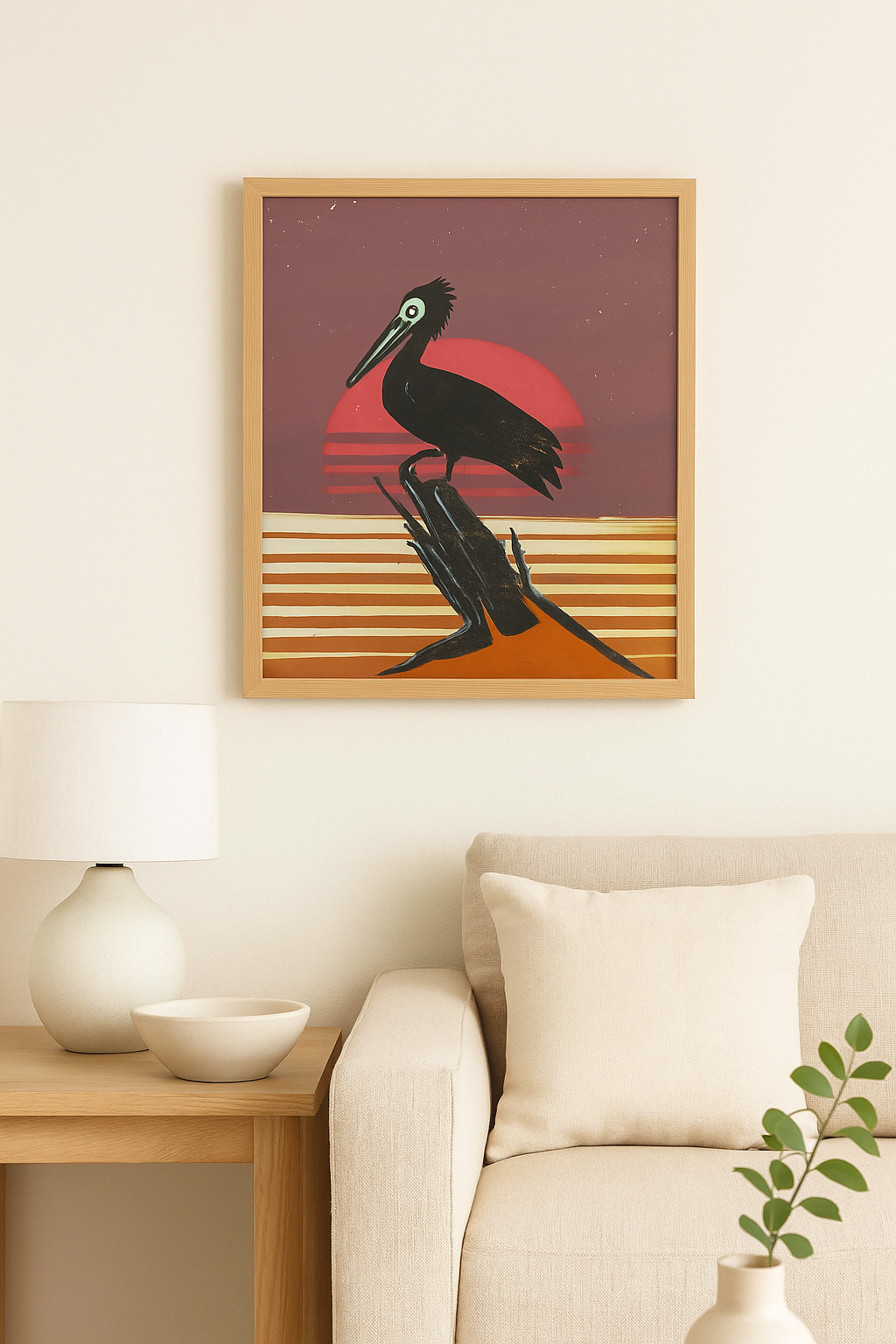 Framed artwork of a pelican on a wall in a living room.